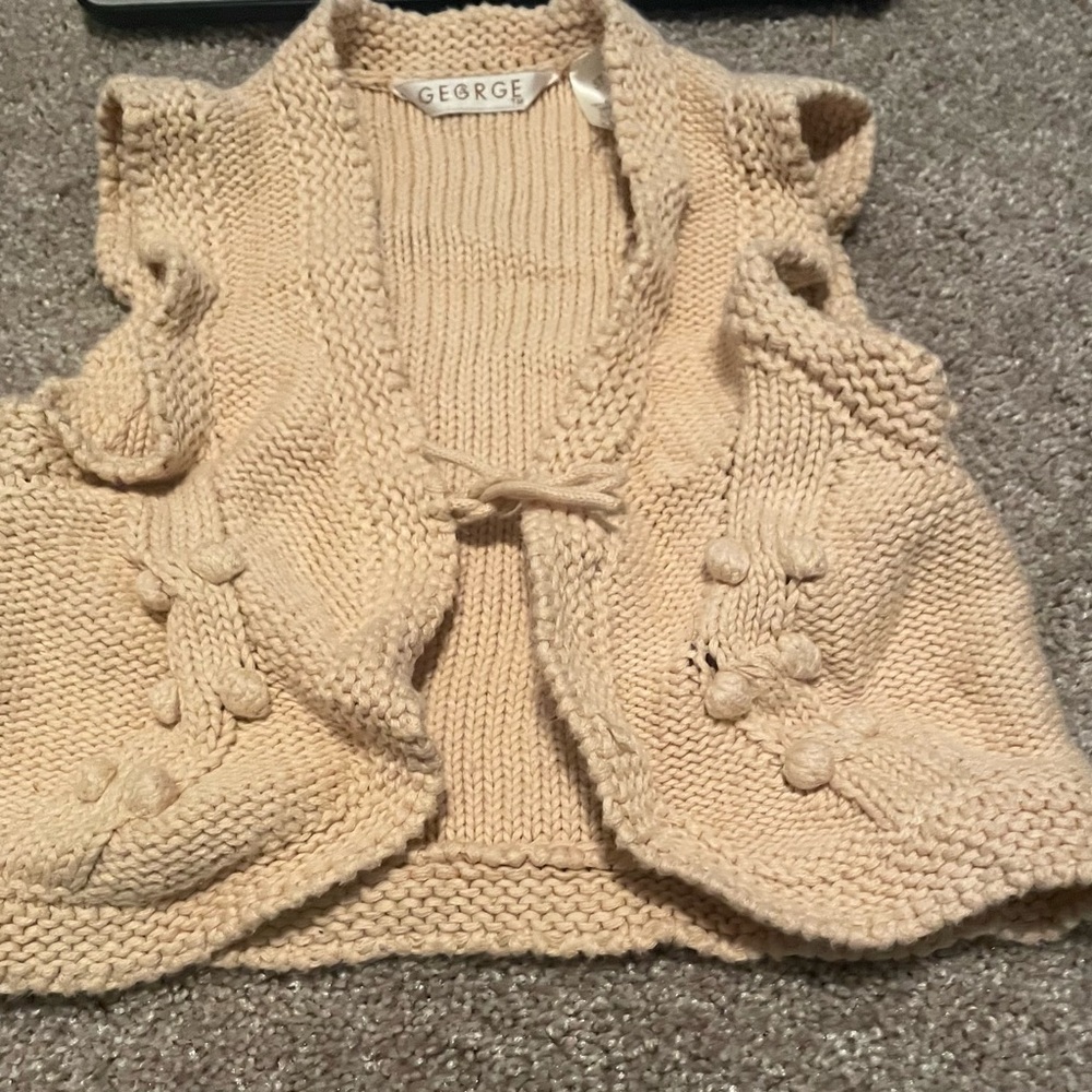 Cream colored knit toddler cardigan